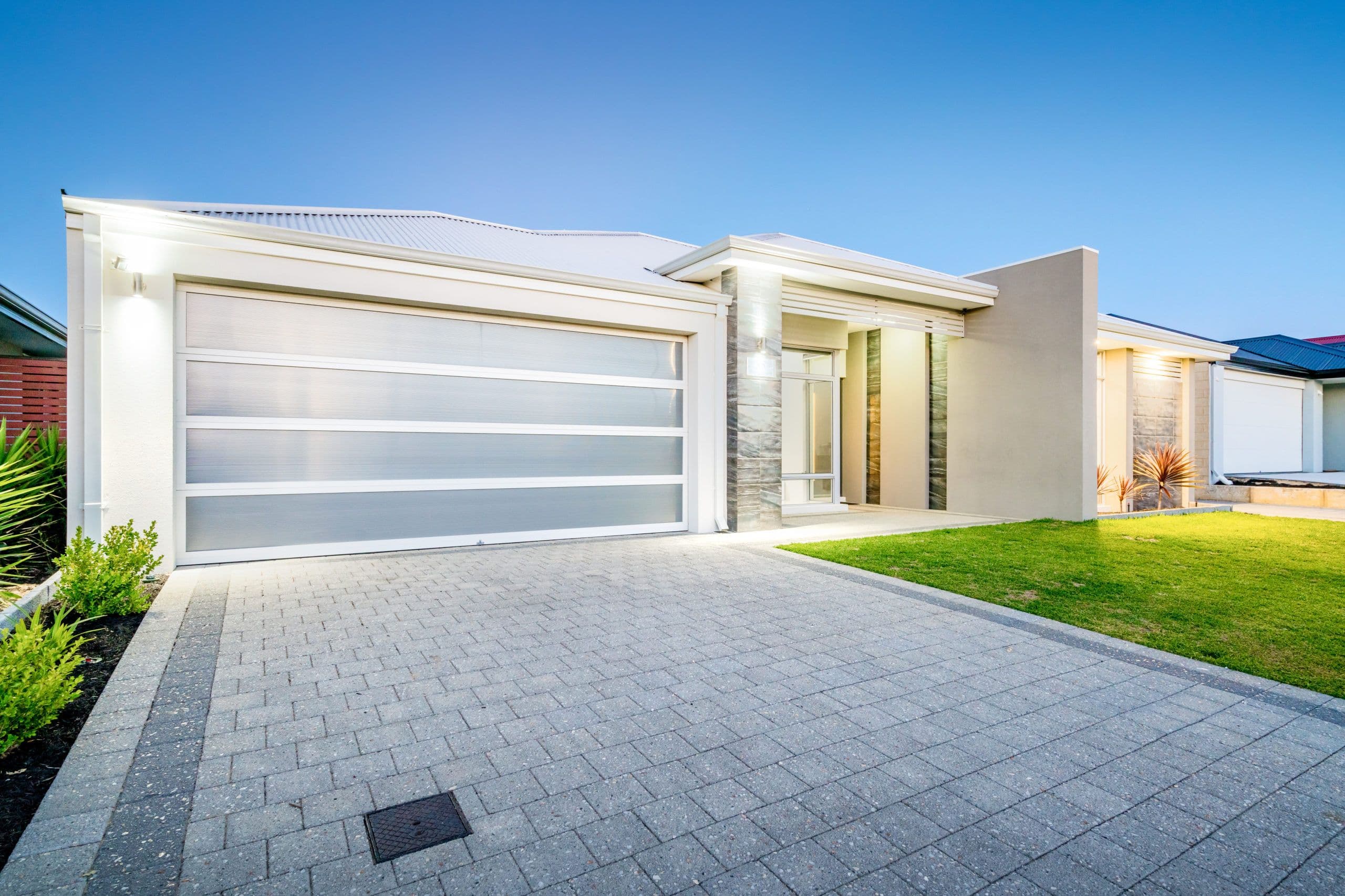 Contemporary home facade with driveway paving selections